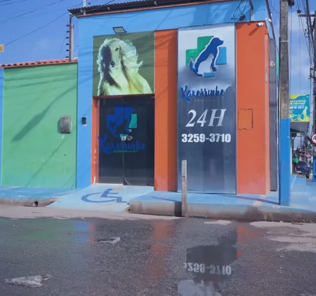 Fachada da Kaxorrinho com placa 24H